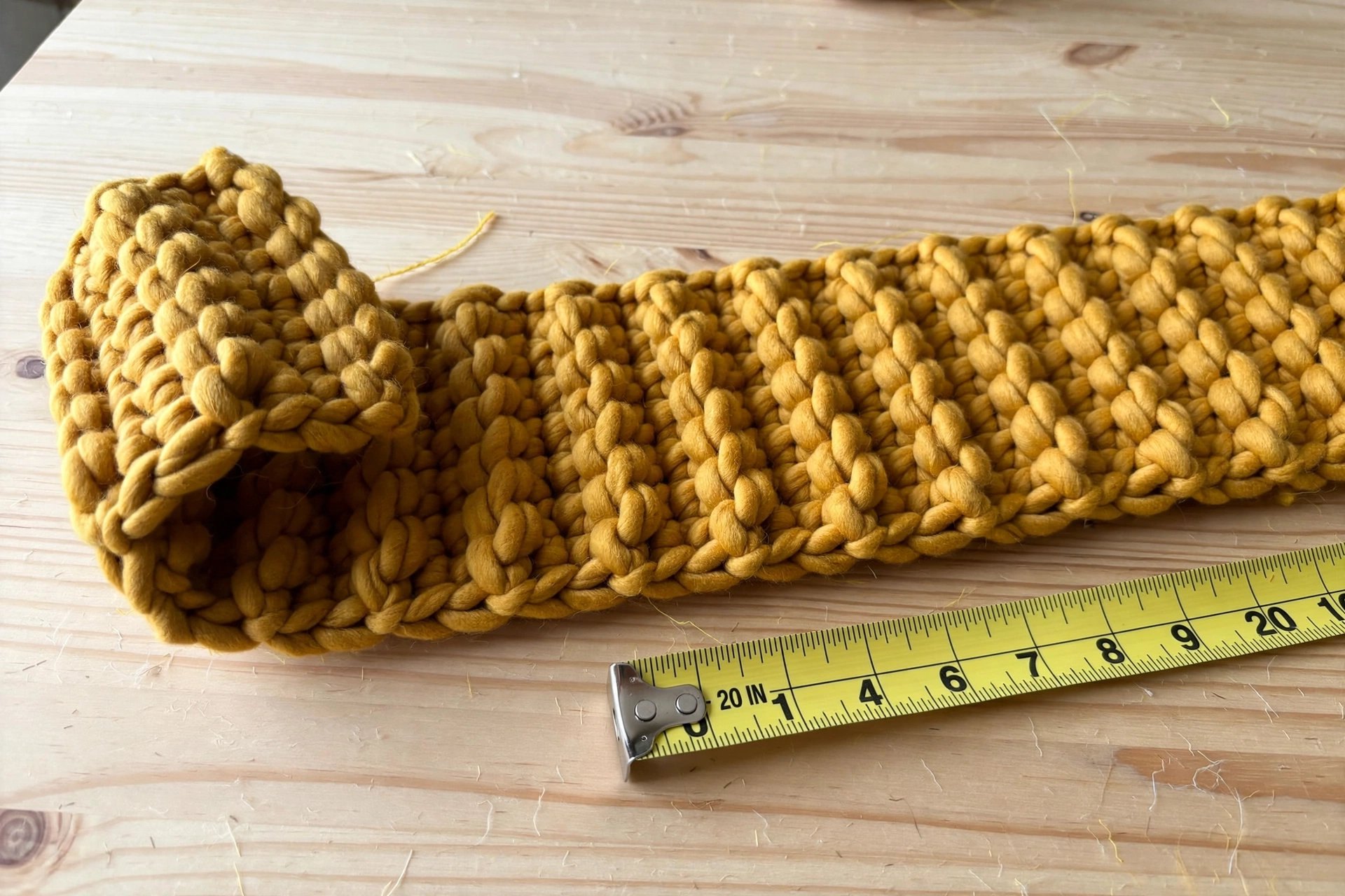 ribbed crochet brim strip 20 inches measuring tape mustard chunky yarn curling