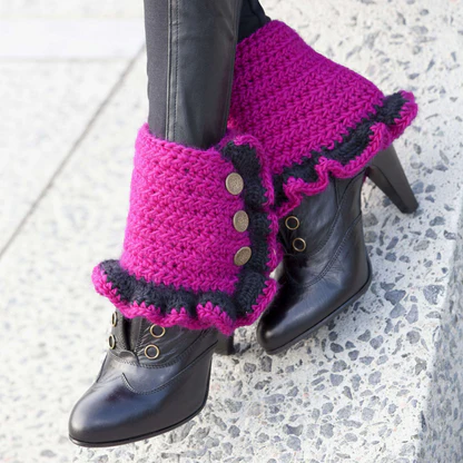 Funky crochet spats in magenta with black ruffle and brass buttons on black boots